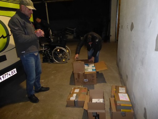 Volunteers packing supplies for the Ukrainian people